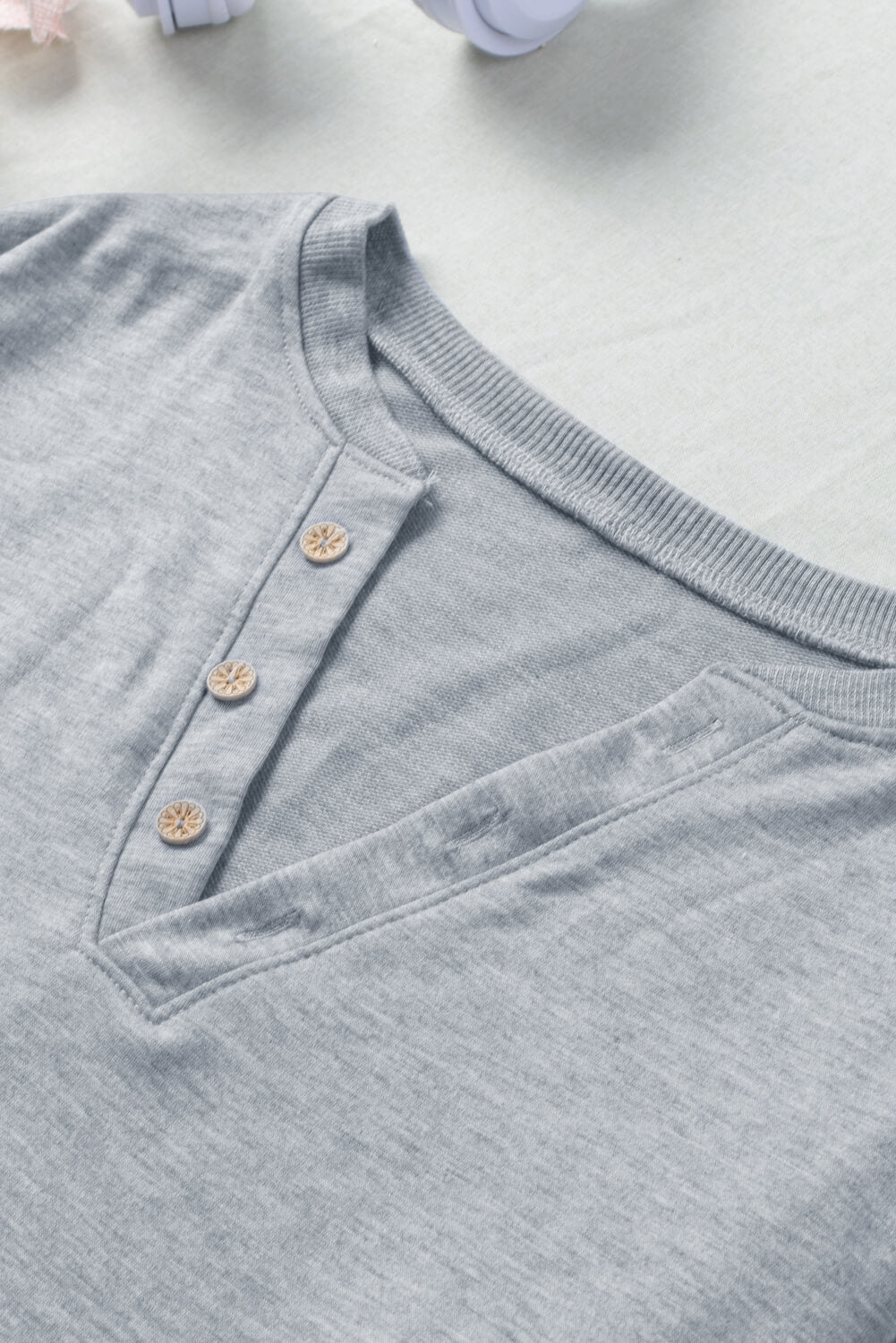 Button Detail Curved Hem Top